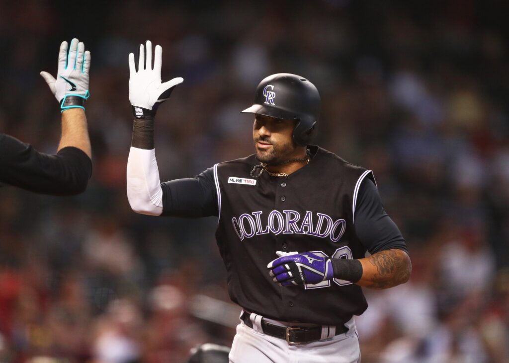 Rockies sweep Diamondbacks with late rally in extra-inning win