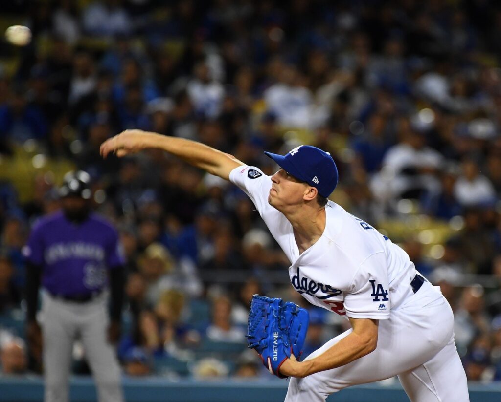Dodgers walk off on Rockies after brilliant pitcher’s duel
