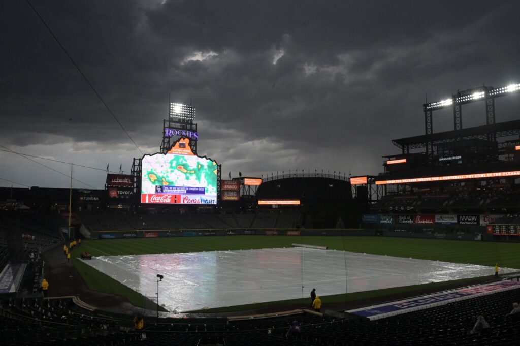 Reds rain on Freeland’s return on ridiculous night at Coors