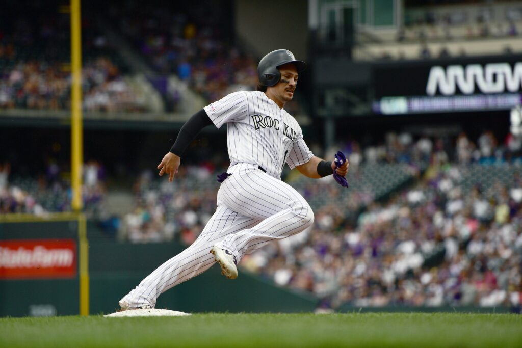 Rockies take series from Reds after hanging on in a nail-biter