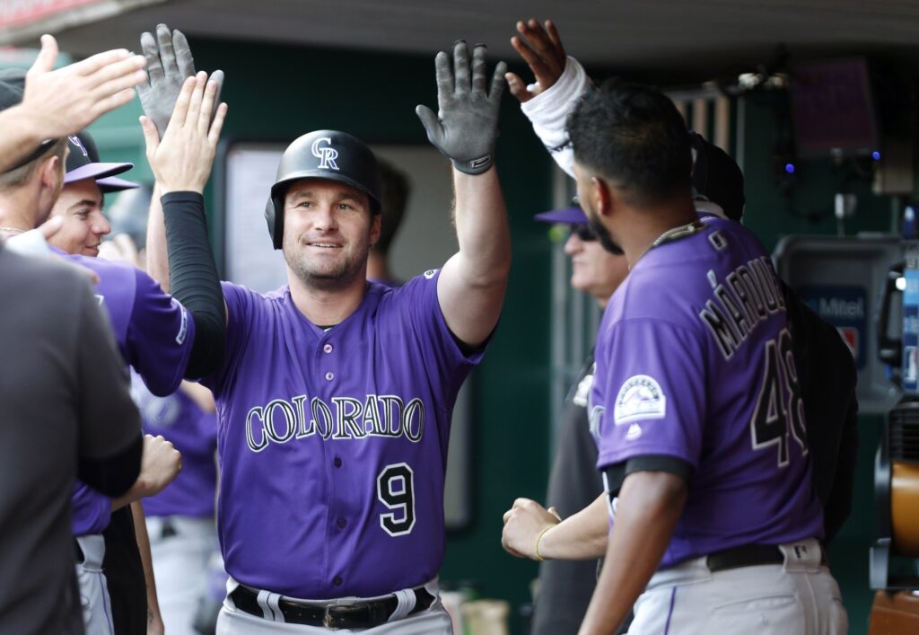 Rockies run away from Reds in lopsided win