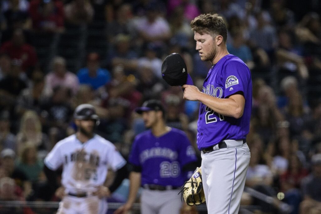 Freeland exits early; Rockies comeback incomplete in loss