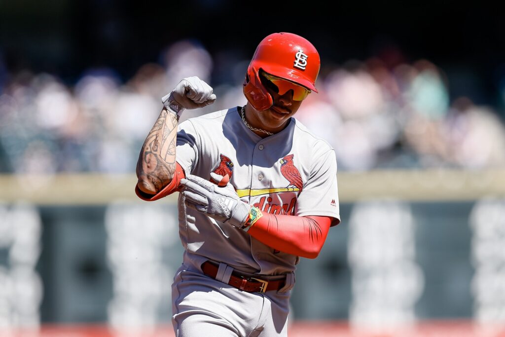 Cards salvage game in set as Rockies pitching falls apart