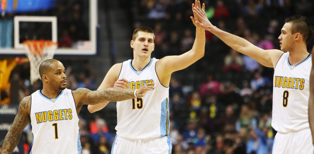 Nuggets coast past Magic, now tied with Portland for eighth in the West