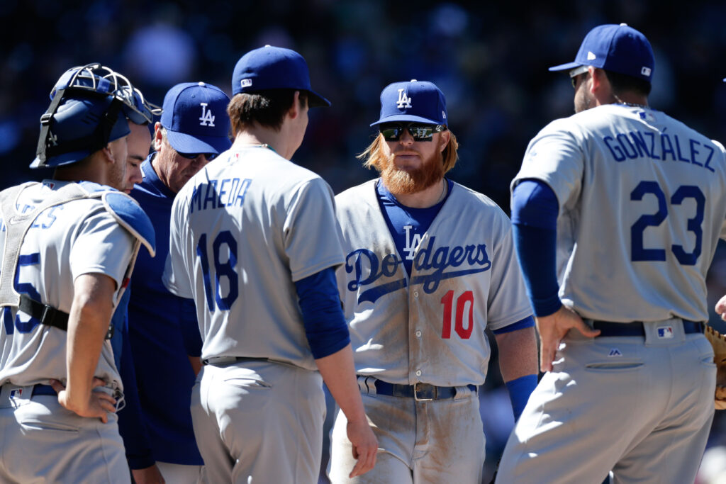 Rockies blow chance to sweep Dodgers in windy affair at Coors