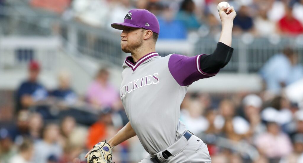 Rockies finally get clutch hits, hold off Braves in 7-6 win