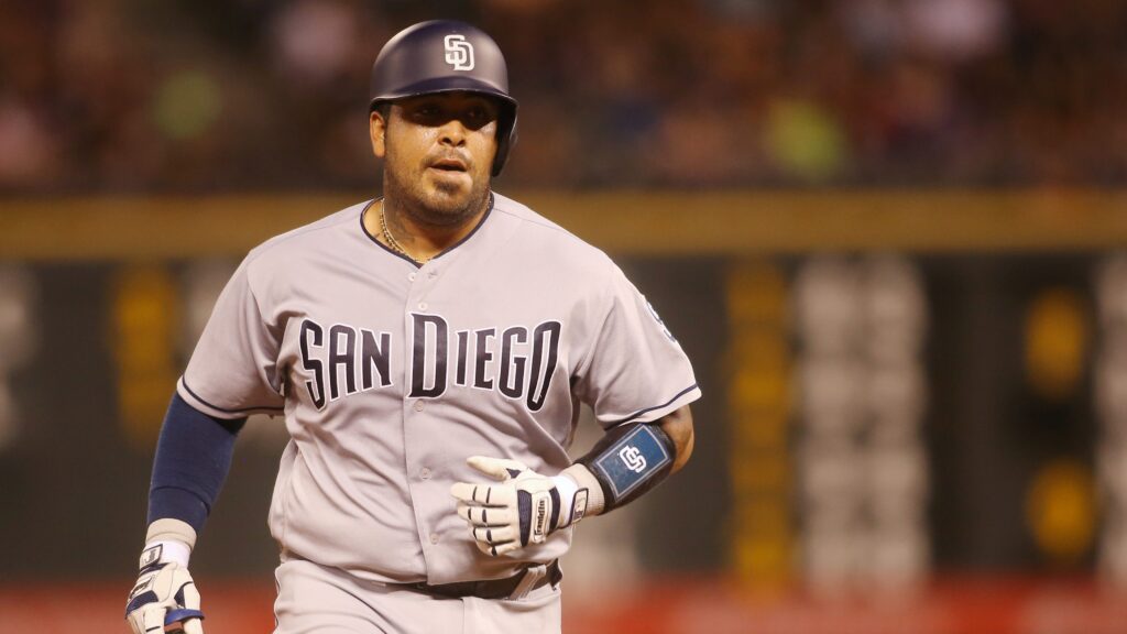 Padres squeeze past Rockies to avoid sweep