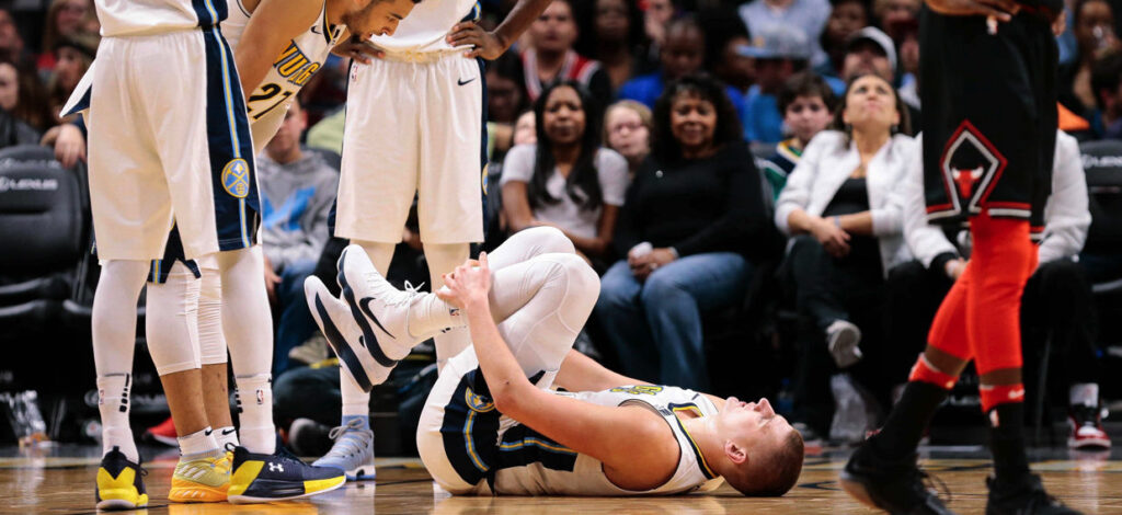Will Barton’s heroics save Nuggets but concerns lie with Nikola Jokic after scary ankle injury