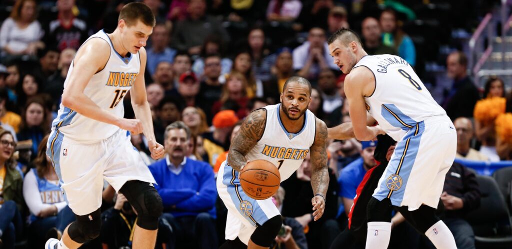 Nuggets visit Trailblazers without Emmanuel Mudiay
