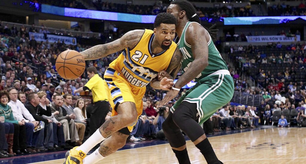 Nuggets visit Celtics as Malone vows to change starting lineup