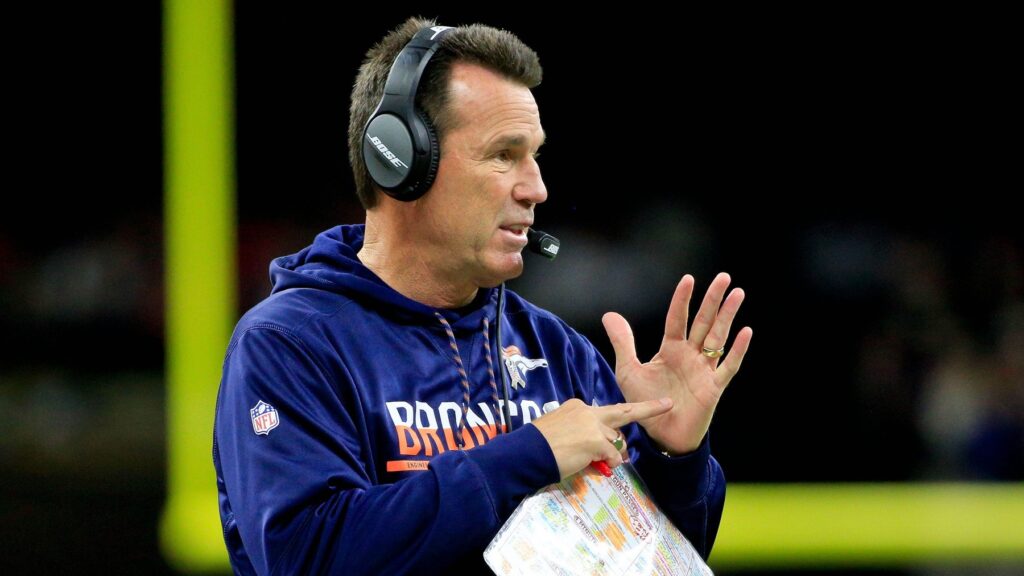 Broncos’ Gary Kubiak reacts to a wild win