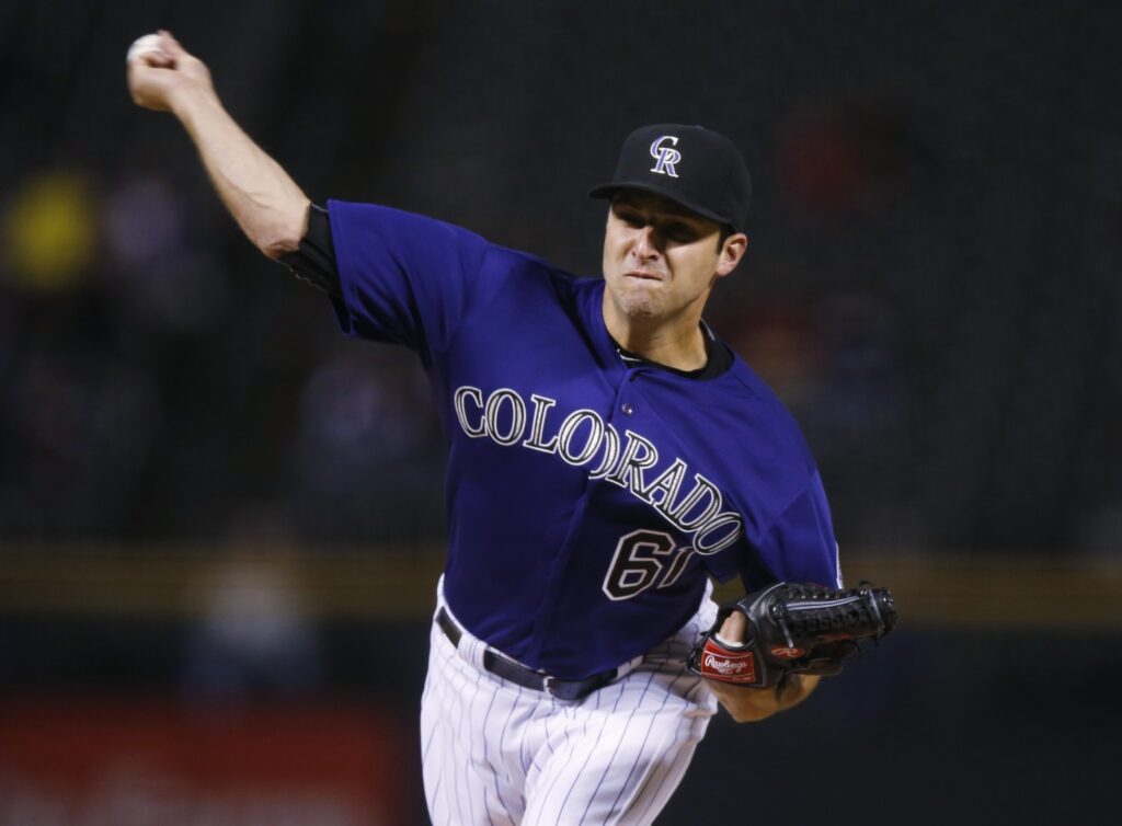Colorado Rockies win one, lose one in long day at Coors Field