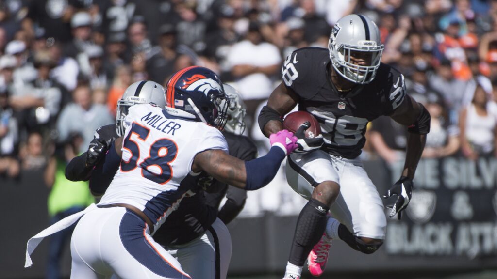 Watch: Von Miller steals the ball from Derek Carr