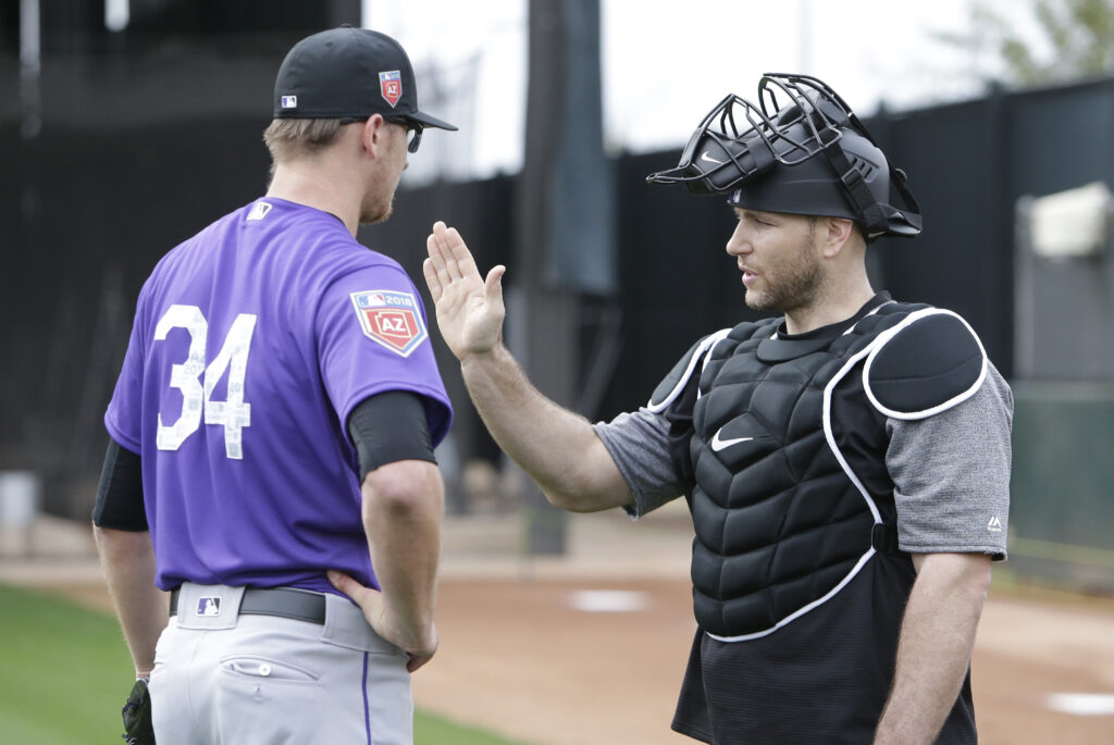 Rockies GM has faith in his new old catcher