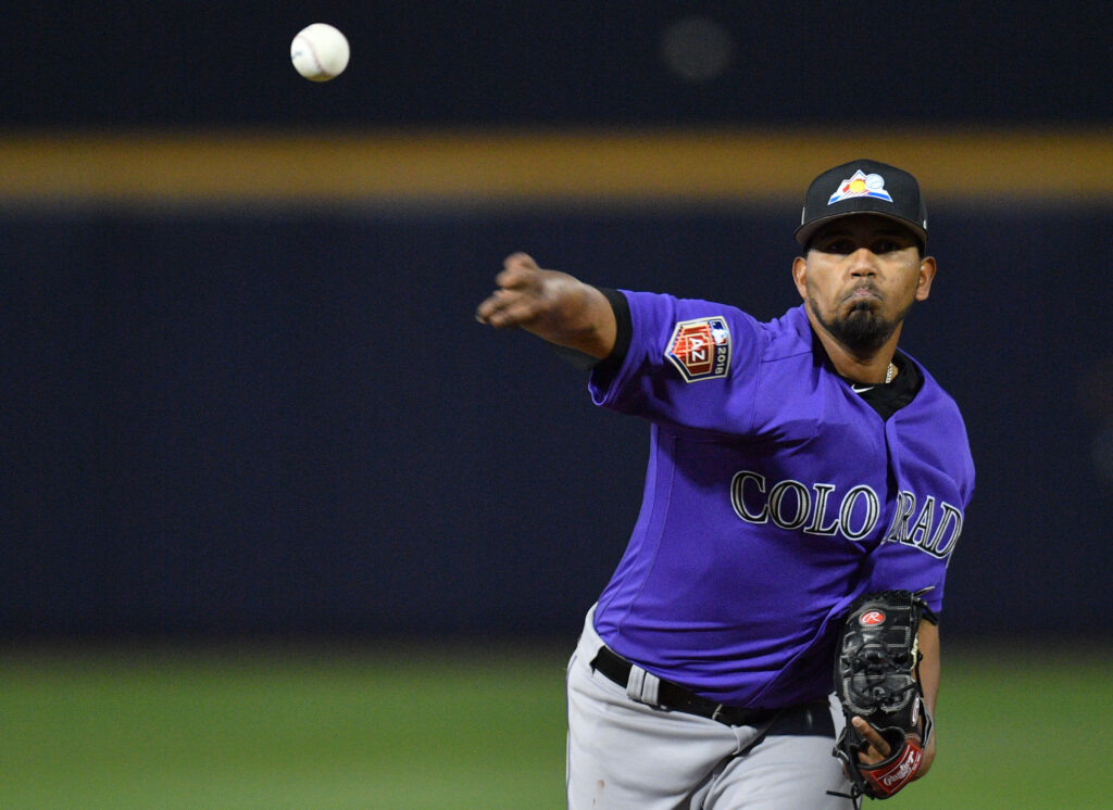 Rockies pitching dominates in 3-2 win over Mariners