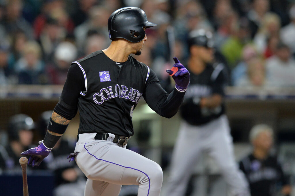 Rockies homer thrice in 7-4 victory over Padres