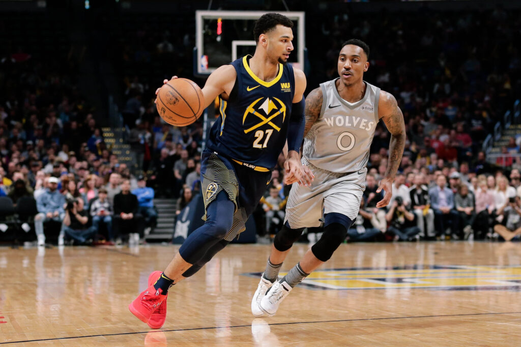 Nuggets edge Timberwolves to keep playoff hopes alive