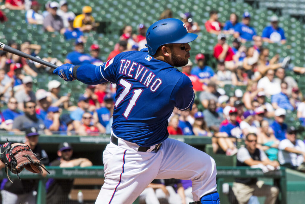 Rangers rally late to even series with Rox