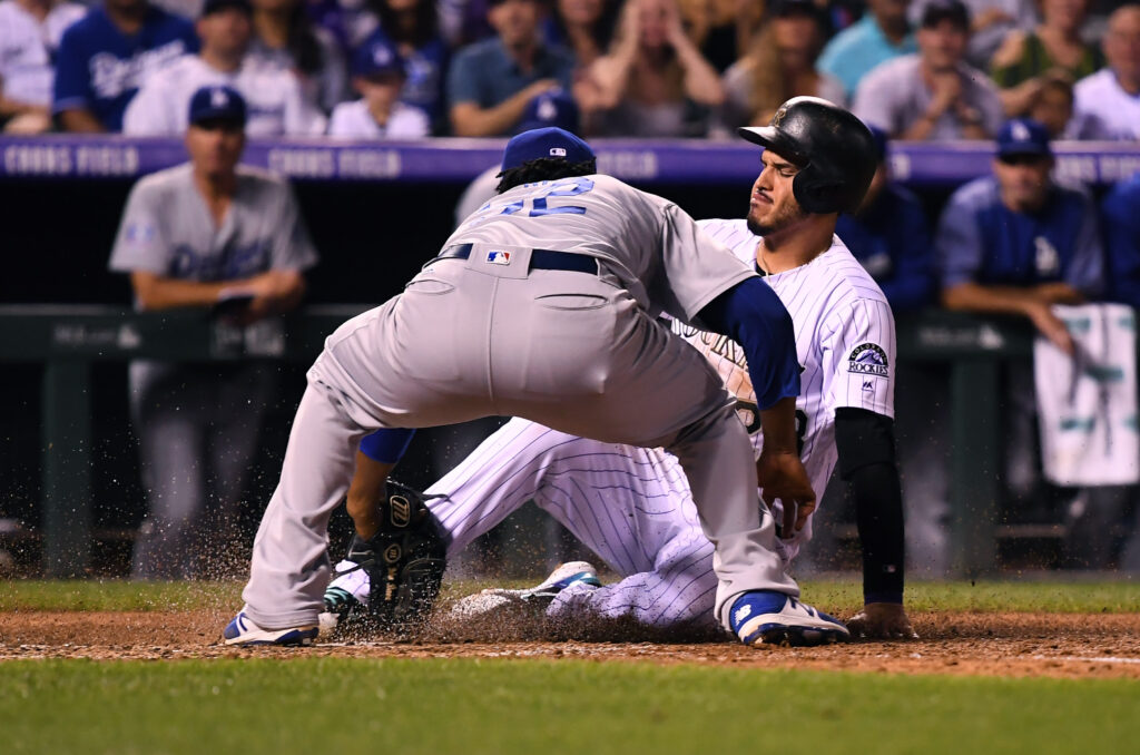 Nolan Arenado removed from game with apparent injury