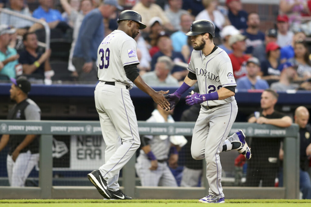 Rockies young guns come through in late rally to beat Braves