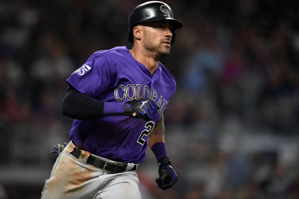 Down to their final strike, Rockies rally to beat Braves in extras