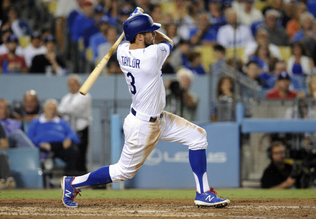 Dodgers walk off on Rockies in extras