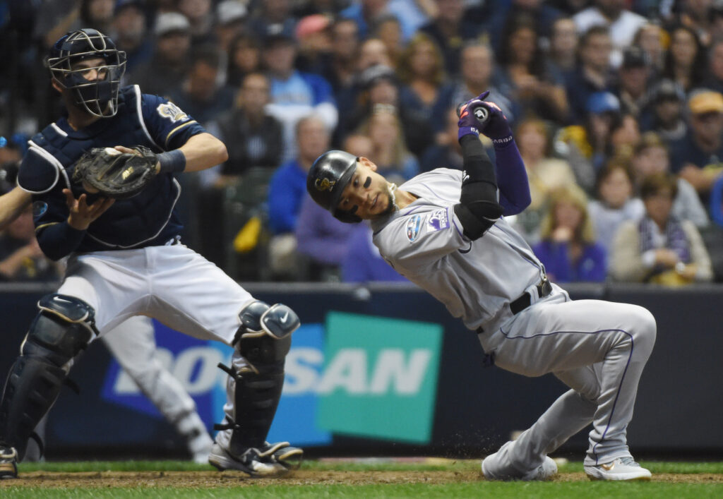 Rockies force extras but lose heartbreaker in first game of NLDS