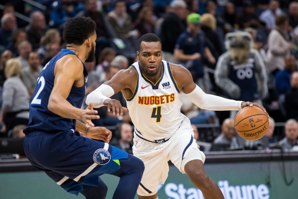 Battered, bruised Paul Millsap leads Nuggets over Timberwolves
