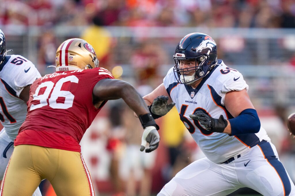 Who will be the Denver Broncos’ starting center?
