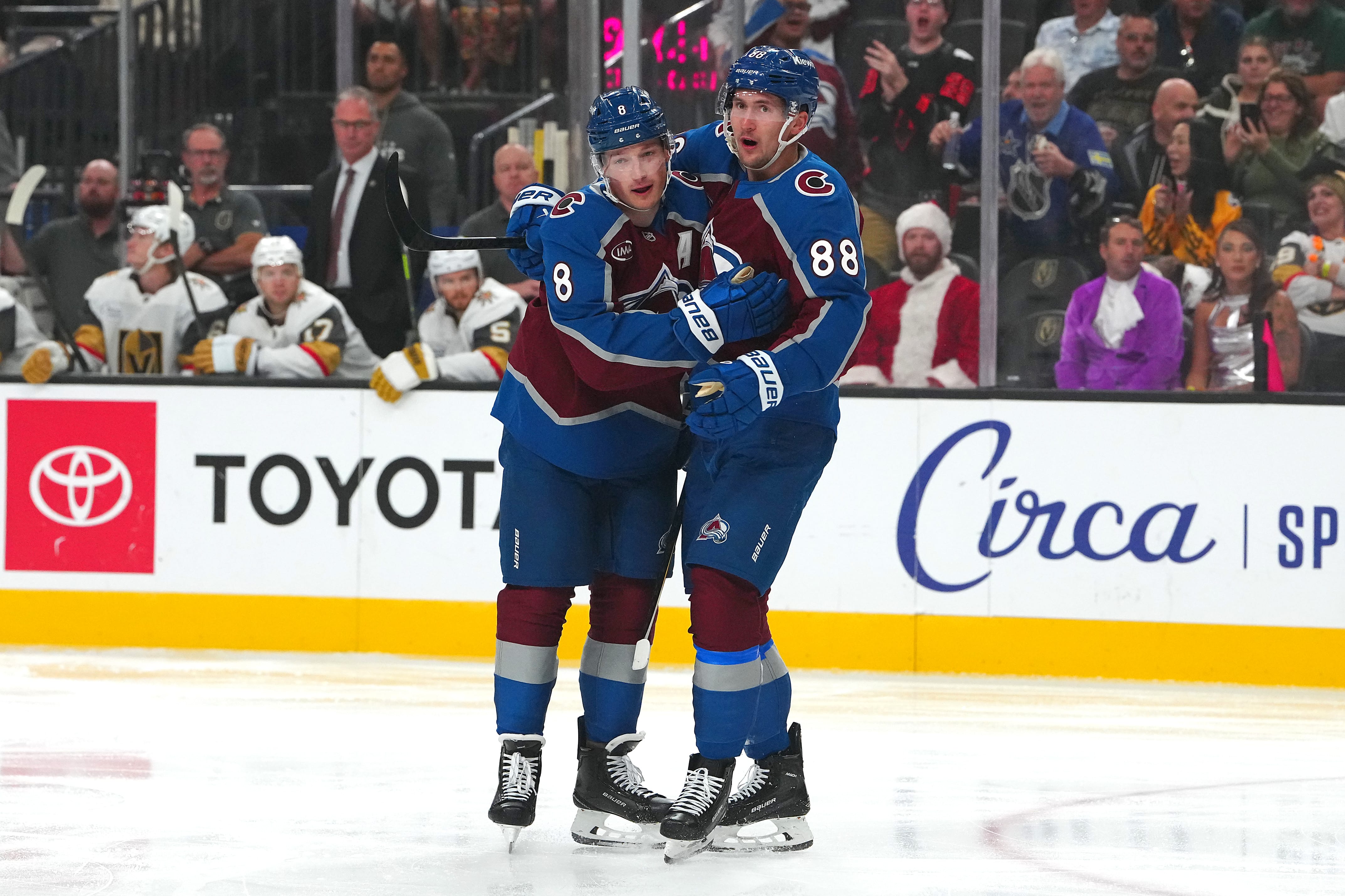 Oct 31, 2025; Las Vegas, Nevada, USA; Colorado Avalanche center Martin Necas (88) celebrates with defenseman Cale Makar (8) after scoring a goal against the Vegas Golden Knights during the first period at T-Mobile Arena. Mandatory Credit: Stephen R. Sylvanie-Imagn Images