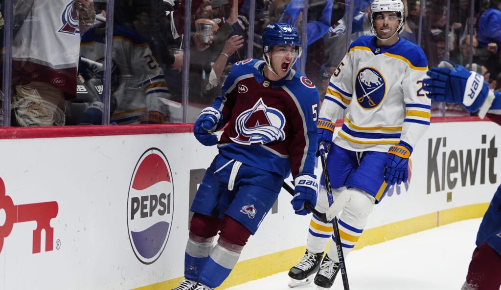 Colorado Avalanche center Gavin Brindley (54) celebrates his goal in the second period against the Buffalo Sabres at Ball Arena. Mandatory Credit: Ron Chenoy-Imagn Images