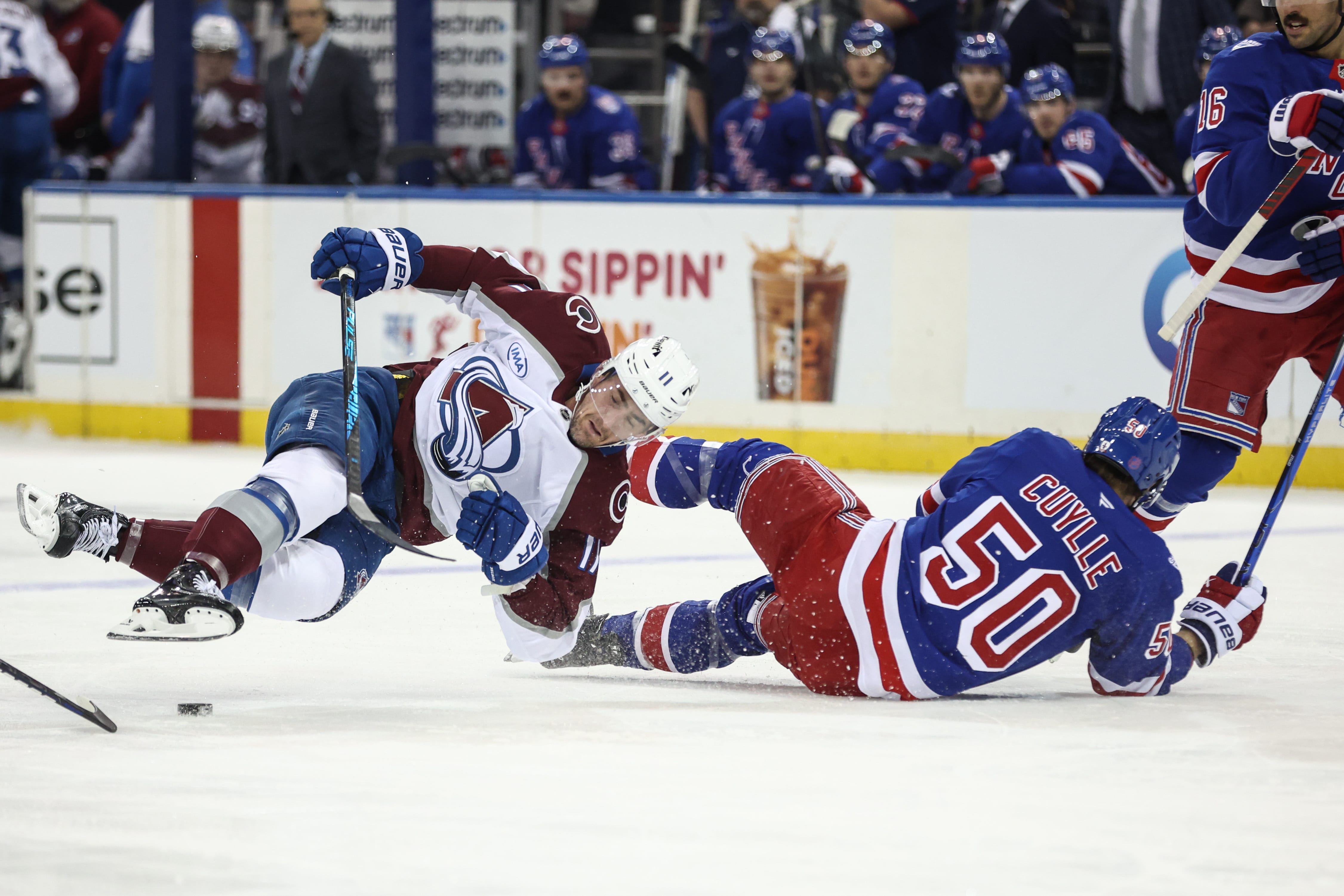 Colorado Avalanche center Brock Nelson (11) collides with New York Rangers left wing Will Cuylle (50) in the first period at Madison Square Garden. Mandatory Credit: Wendell Cruz-Imagn Images