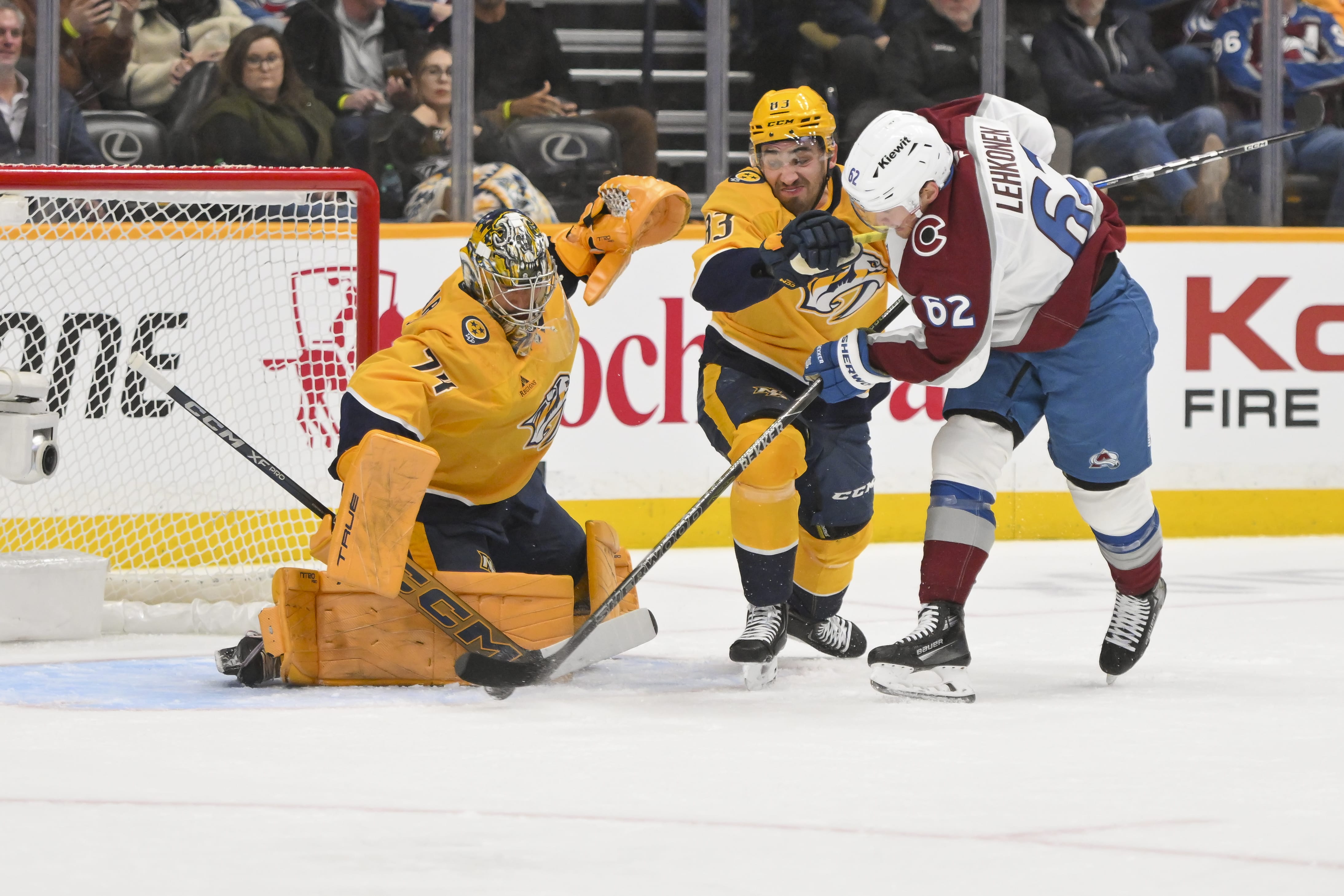 Colorado Avalanche left wing Artturi Lehkonen (62) scores past Nashville Predators goaltender Juuse Saros (74) during the first period at Bridgestone Arena. Mandatory Credit: Steve Roberts-Imagn Images