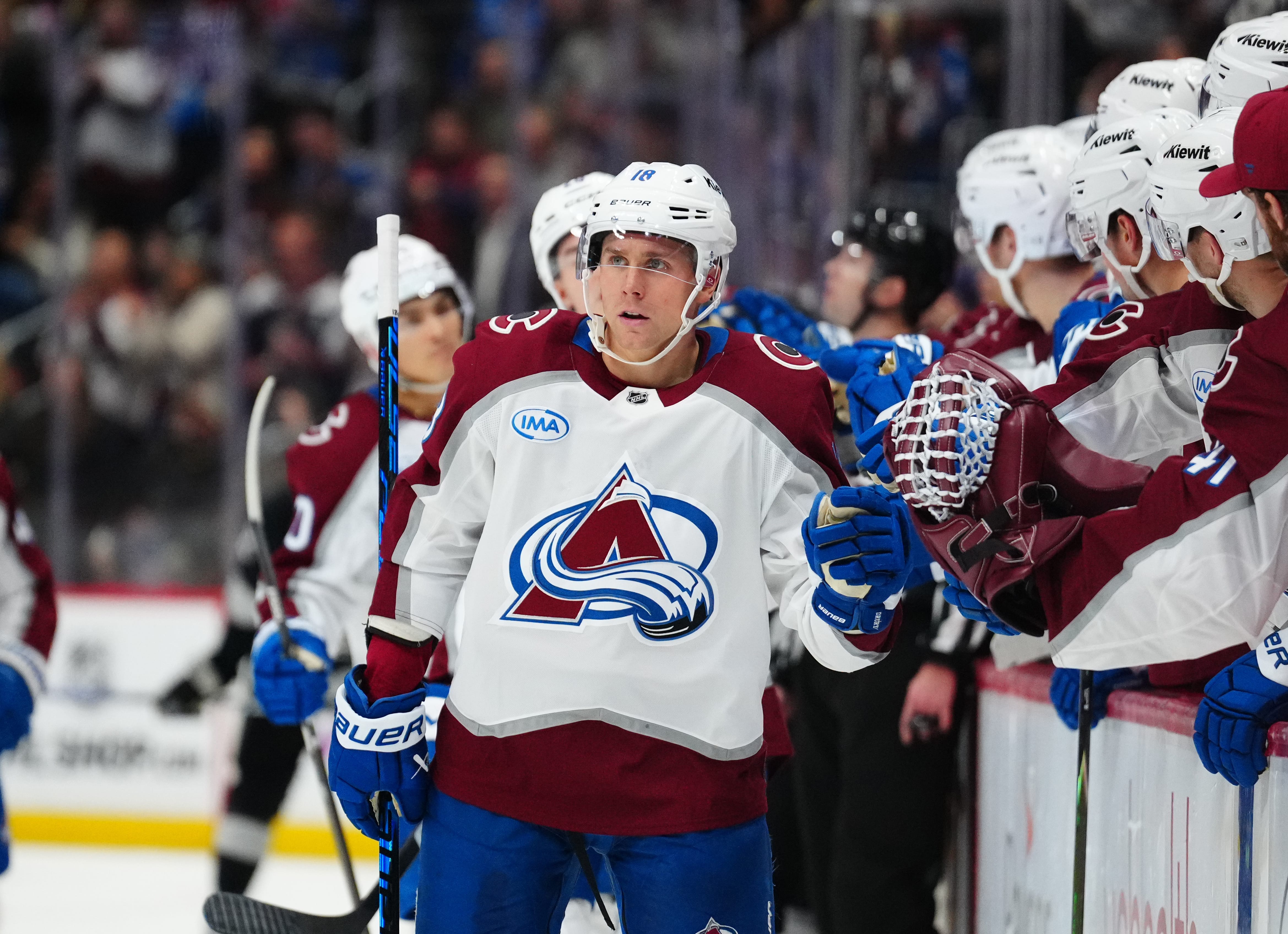 Colorado Avalanche center Jack Drury (18) celebrates a goal with teammates n the first period against the Los Angeles Kings at Ball Arena. Mandatory Credit: Ron Chenoy-Imagn Images
