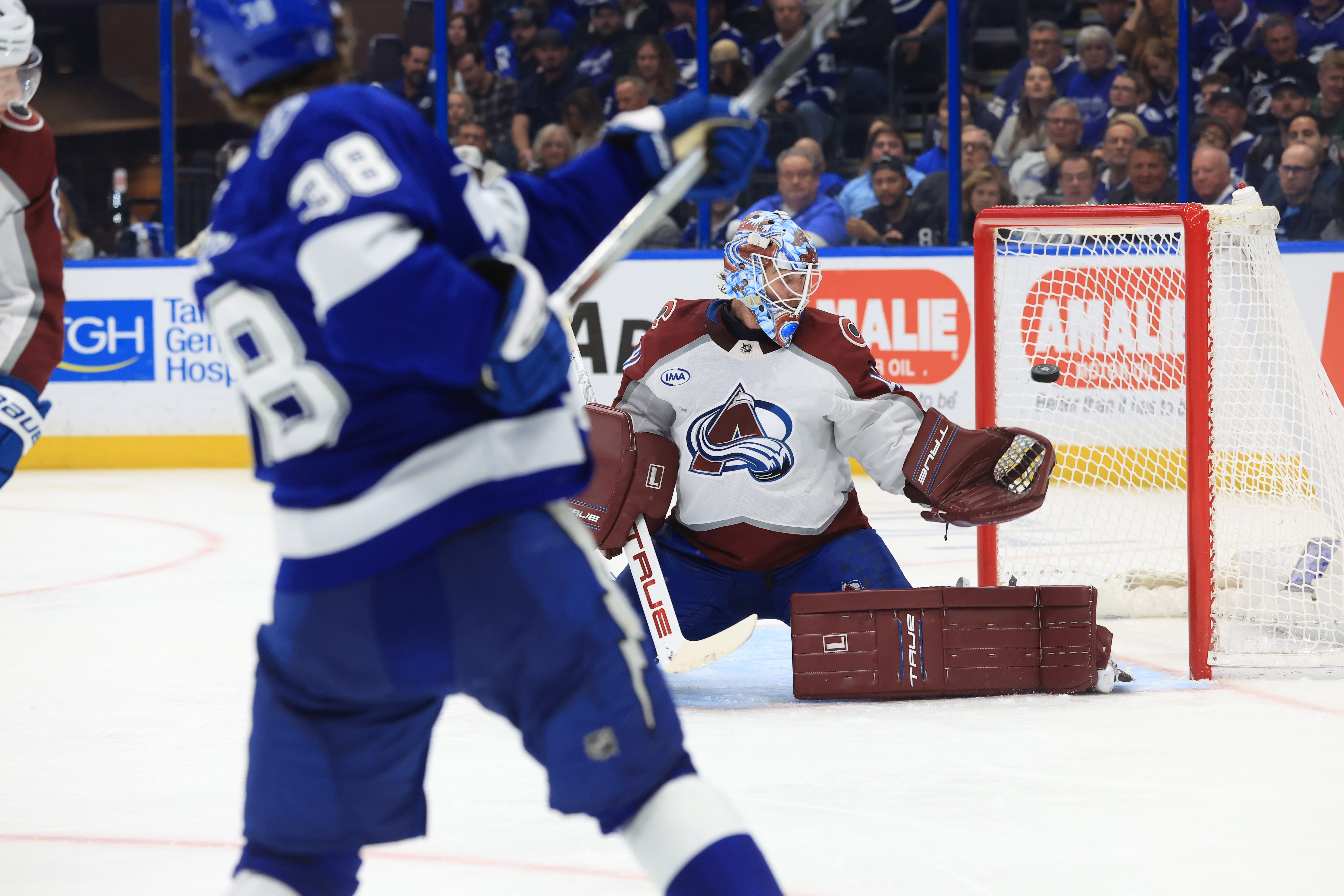 Tampa Bay Lightning left wing Brandon Hagel (38) scores a goal on Colorado Avalanche goaltender Scott Wedgewood (41) during the third period at Benchmark International Arena. Mandatory Credit: Kim Klement Neitzel-Imagn Images