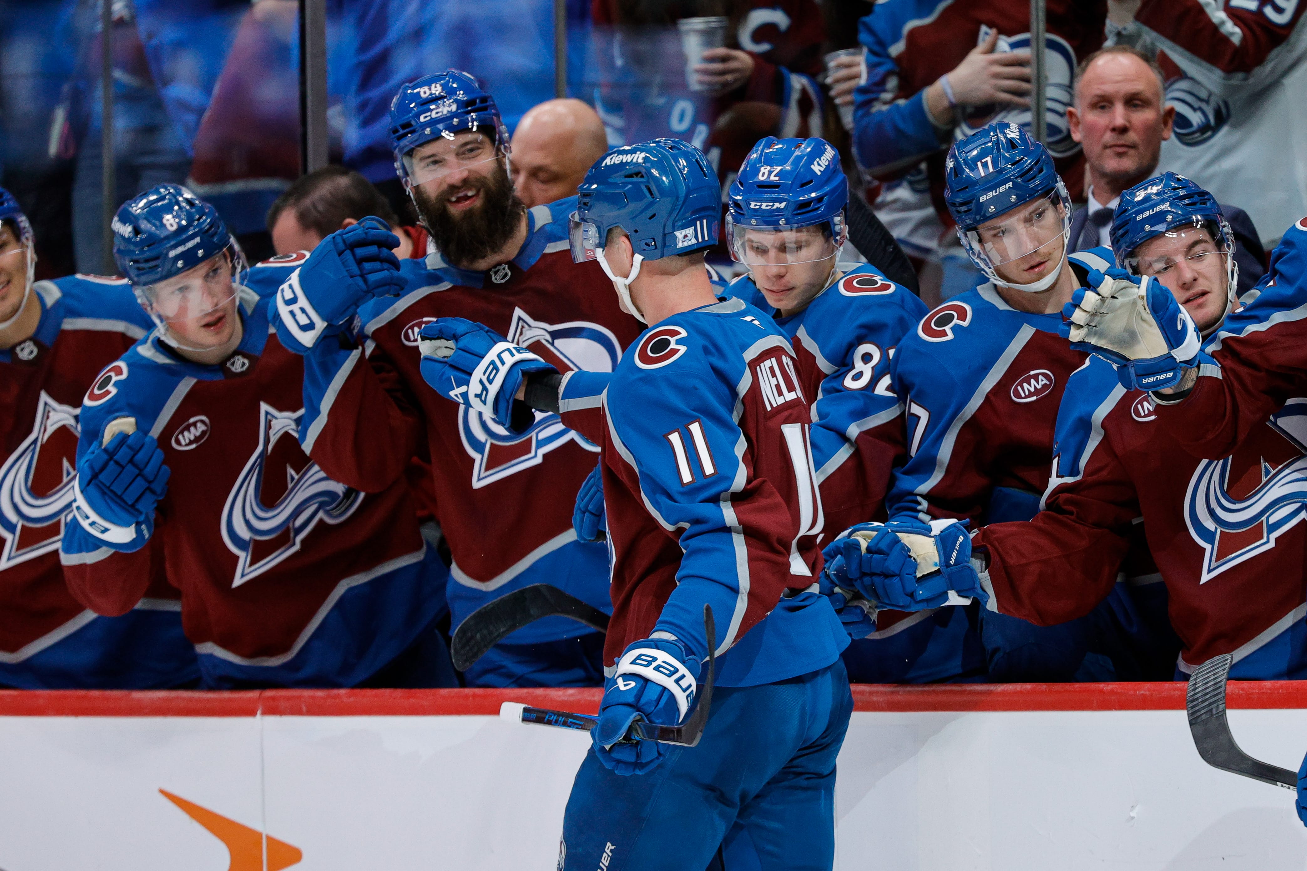 Colorado Avalanche center Brock Nelson (11) celebrates with the bench after his goal in the second period against the Ottawa Senators at Ball Arena. Mandatory Credit: Isaiah J. Downing-Imagn Images