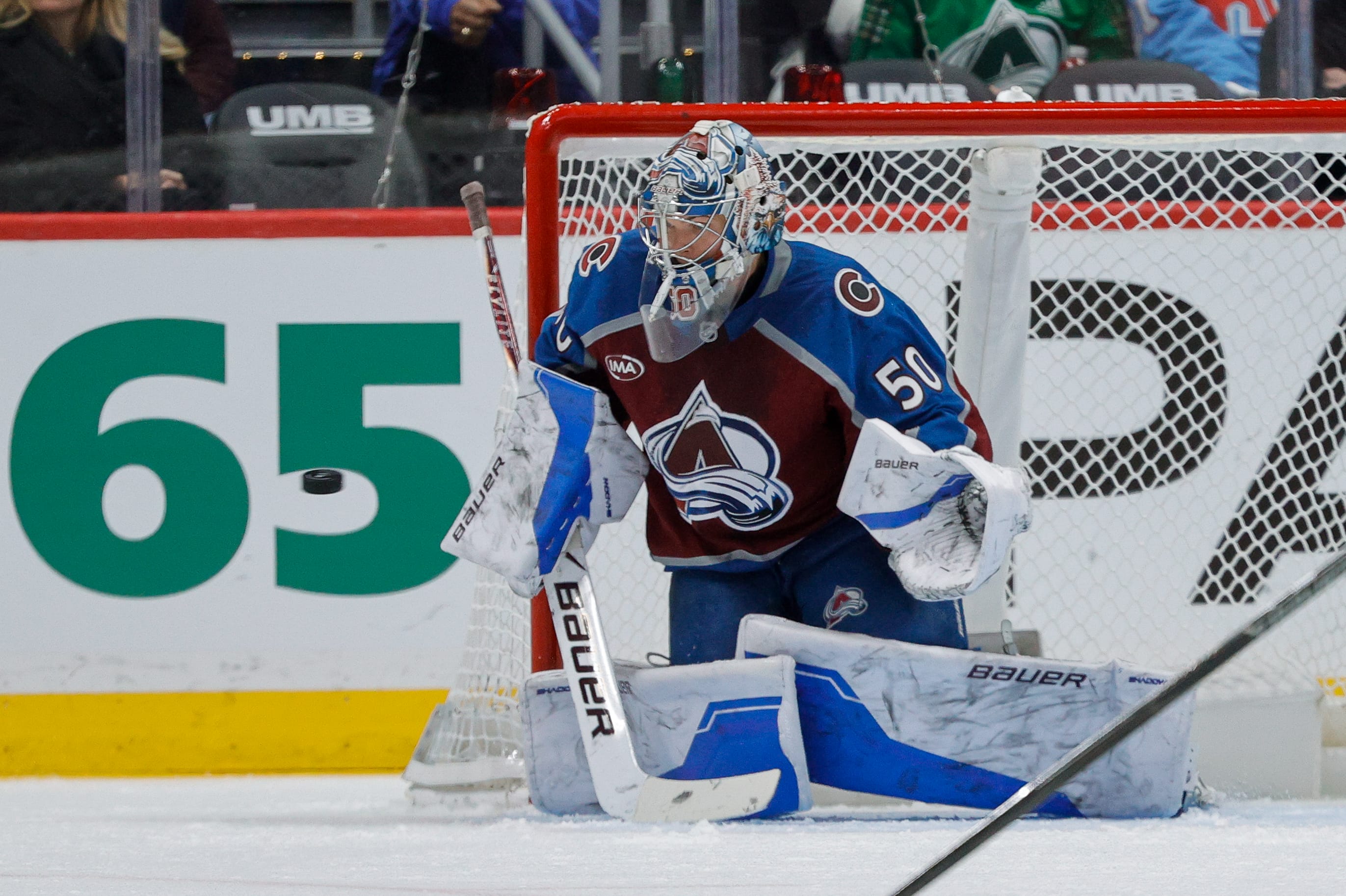 Colorado Avalanche goaltender Trent Miner (50) makes a save on a shot in the second period against the Columbus Blue Jackets at Ball Arena. Mandatory Credit: Isaiah J. Downing-Imagn Images