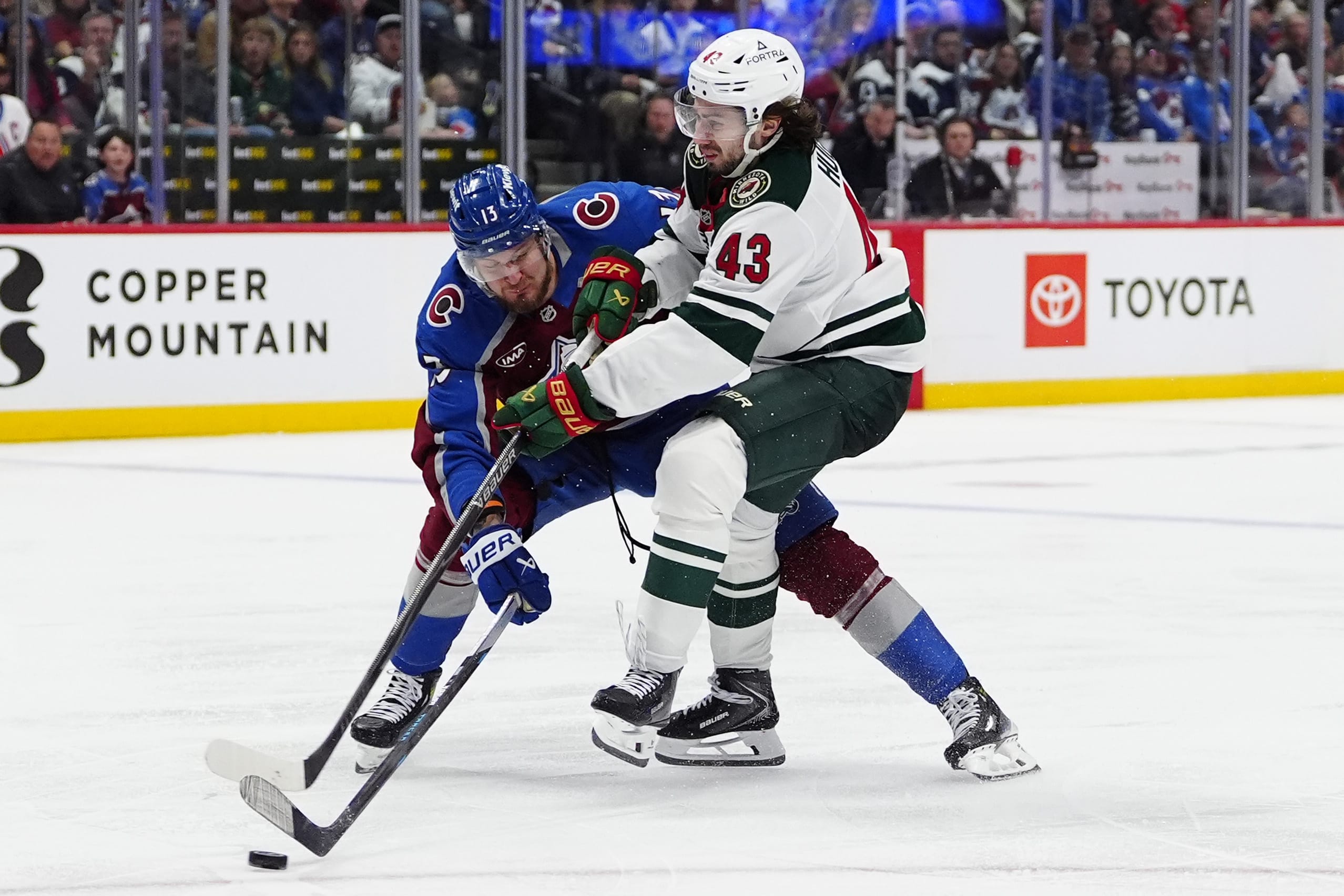 Avs | May 3, 2026; Denver, Colorado, USA; Colorado Avalanche right wing Valeri Nichushkin (13) defends a shot on goal by Minnesota Wild defenseman Quinn Hughes (43) during the third period in game one of the second round of the 2026 Stanley Cup Playoffs at Ball Arena. Mandatory Credit: Ron Chenoy-Imagn Images