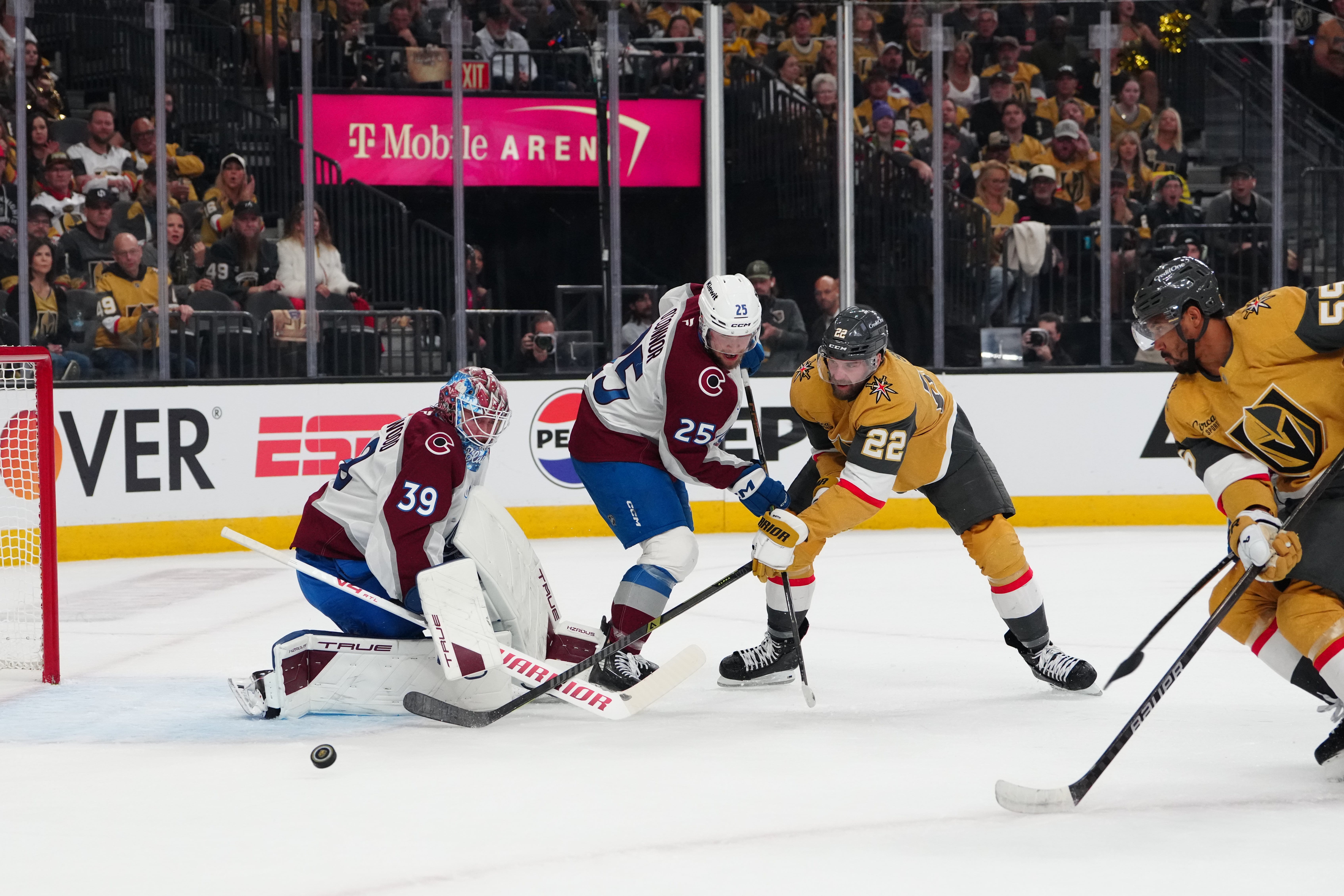 Avs Mackenzie Blackwood making a save on Cole Smith