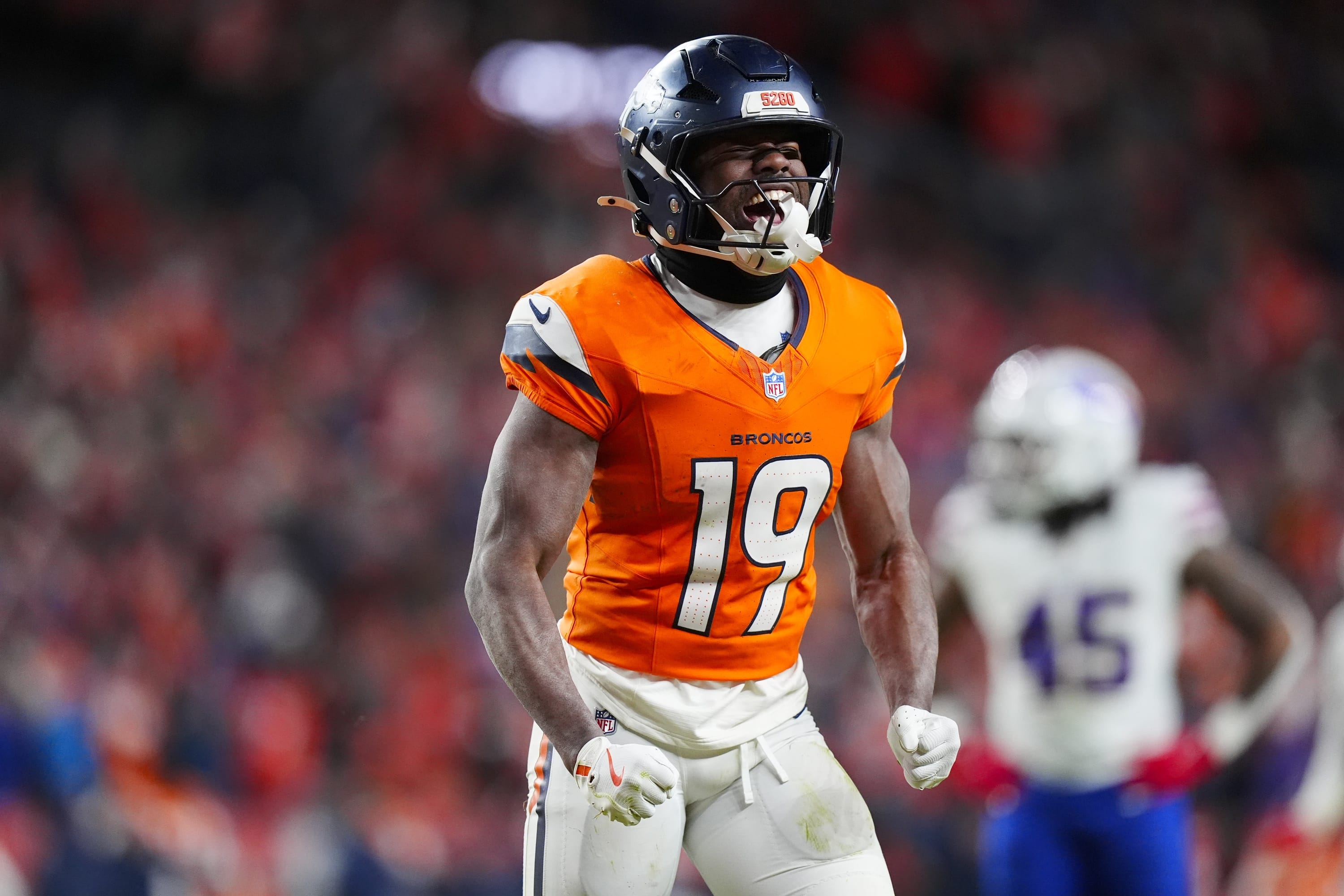 Denver Broncos wide receiver Marvin Mims Jr. (19) reacts after a play during overtime of an AFC Divisional Round playoff game against the Buffalo Bills at Empower Field at Mile High.
