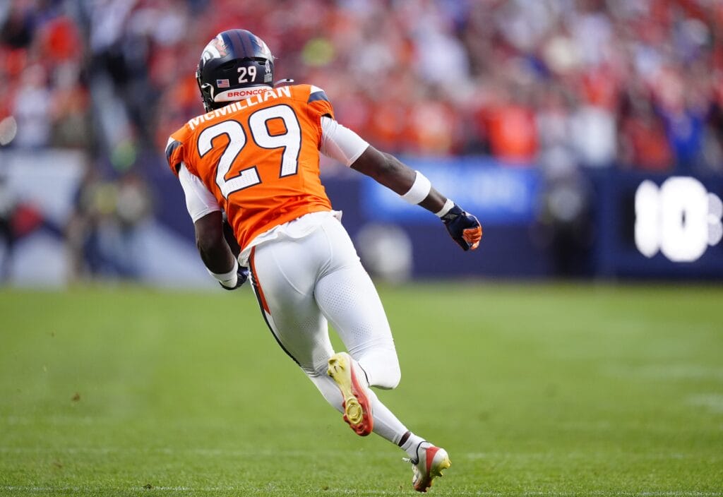 Nov 16, 2025; Denver, Colorado, USA; Denver Broncos cornerback Ja'Quan McMillian (29) returns a interception in the third quarter against the Kansas City Chiefs at Empower Field at Mile High. Mandatory Credit: Ron Chenoy-Imagn Images