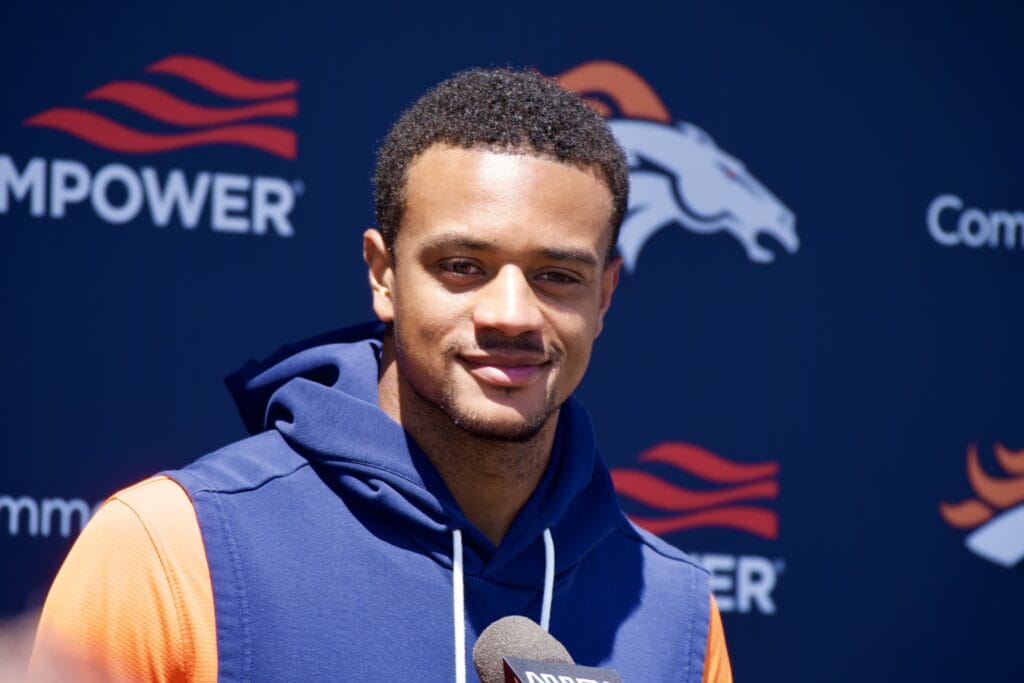 Pat Surtain II reporting for training camp at the Denver Broncos' new facility.