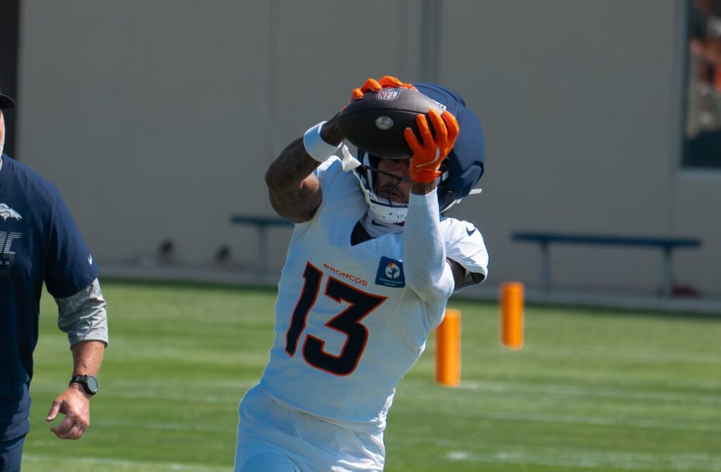 Pat Bryant catching a pass during Denver Broncos' training camp. Photo credit: Nick Ruscetti