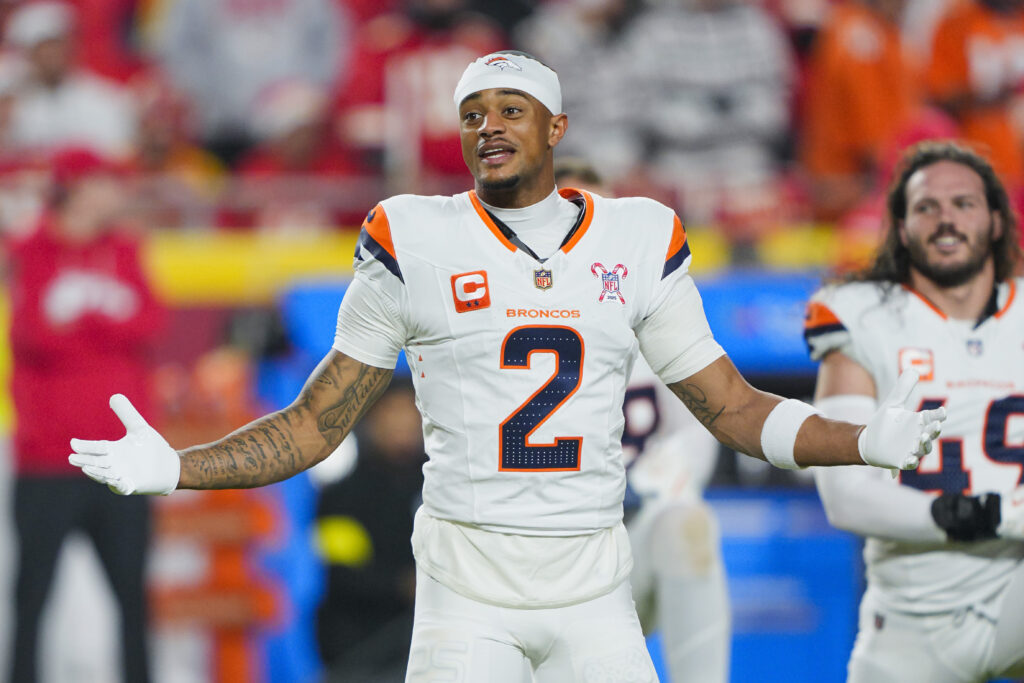 Dec 25, 2025; Kansas City, Missouri, USA; Denver Broncos cornerback Pat Surtain II (2) warms up prior to a game against the Kansas City Chiefs at GEHA Field at Arrowhead Stadium. Mandatory Credit: Jay Biggerstaff-Imagn Images