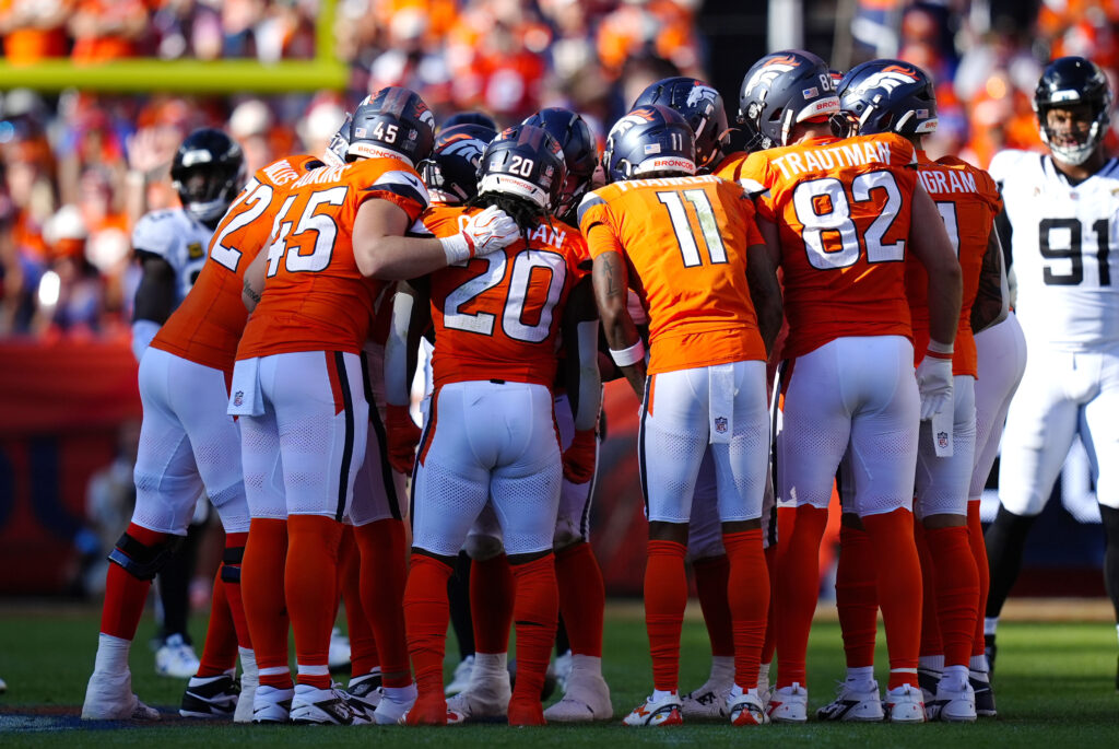 Sep 20, 2026; Denver, Colorado, USA; The Denver Broncos huddle up in the during the fourth quarter against the Jacksonville Jaguars at Empower Field at Mile High. Mandatory Credit: Ron Chenoy-Imagn Images