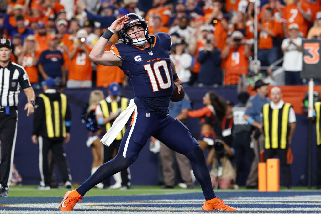 Sep 27, 2026; Denver, Colorado, USA; Denver Broncos quarterback Bo Nix (10) celebrates after scoring a touchdown against the Los Angeles Rams during the second half at Empower Field at Mile High. Mandatory Credit: Isaiah J. Downing-Imagn Images