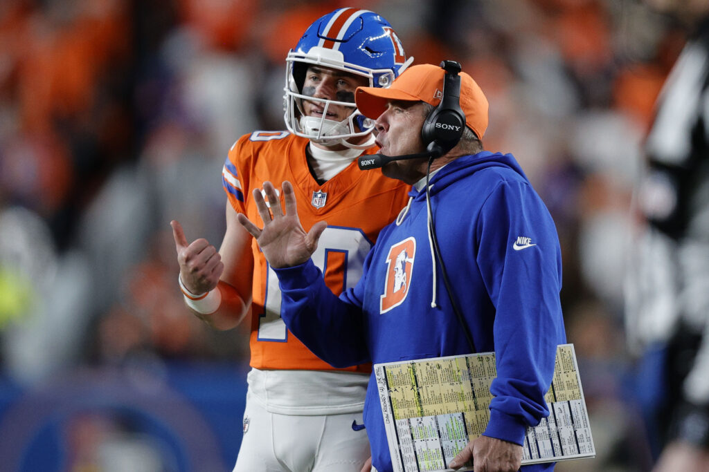 Nov 6, 2025; Denver, Colorado, USA; Denver Broncos head coach Sean Payton talks with quarterback Bo Nix (10) during the second half at Empower Field at Mile High. Mandatory Credit: Isaiah J. Downing-Imagn Images