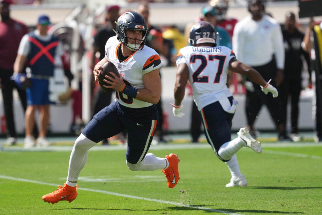 Oct 4, 2026; Santa Clara, California, USA; Denver Broncos quarterback Bo Nix (10) rolls out against the San Francisco 49ers during the first half at Levi's Stadium. Mandatory Credit: Darren Yamashita-Imagn Images