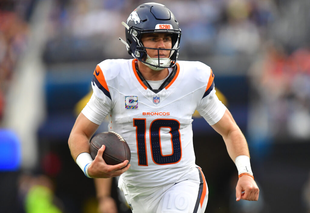 Oct 11, 2026; Inglewood, California, USA; Denver Broncos quarterback Bo Nix (10) runs the ball against the Los Angeles Chargers during the second half at SoFi Stadium. Mandatory Credit: Gary A. Vasquez-Imagn Images