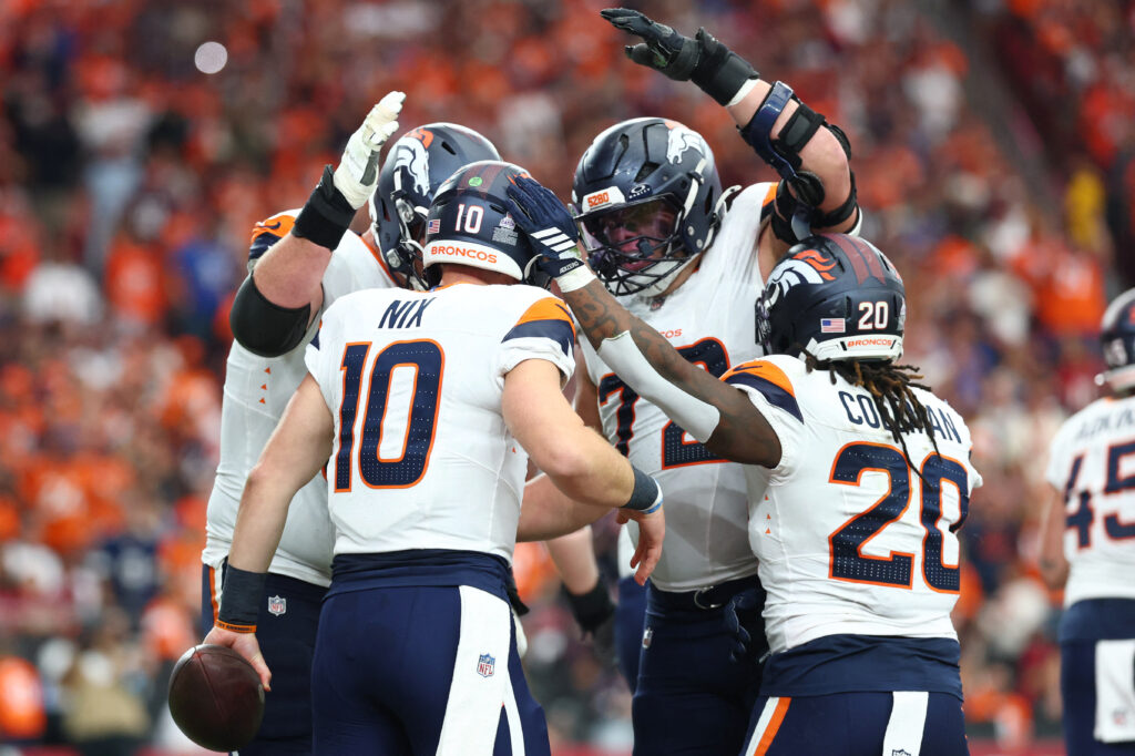 Oct 25, 2026; Glendale, Arizona, USA; Denver Broncos quarterback Bo Nix (10) celebrates with teammates after scoring a touchdown against the Arizona Cardinals during the first half at State Farm Stadium. Mandatory Credit: Mark J. Rebilas-Imagn Images